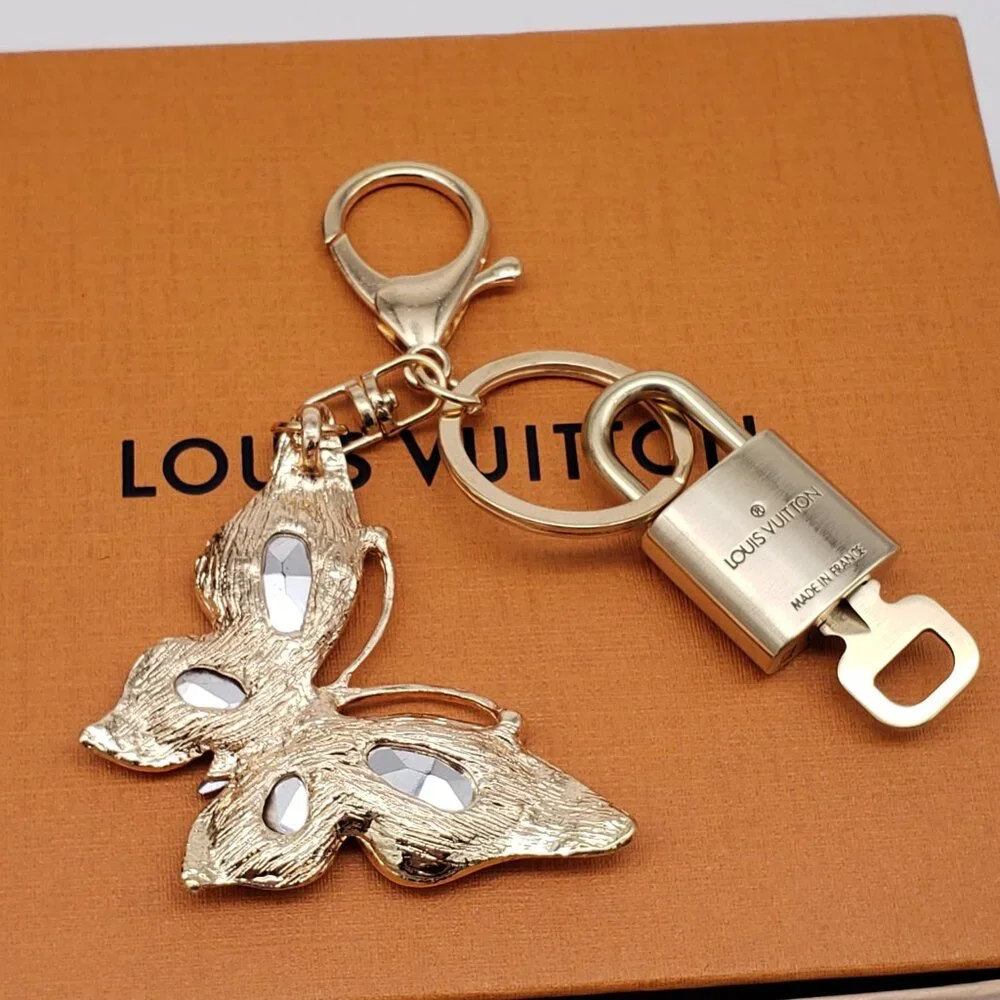 Authentic Louis Vuitton Gold Lock & Box w/ Unbranded Butterfly Bagcharm